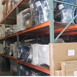 warehouse racks where furniture is wrapped and stored in warehouse