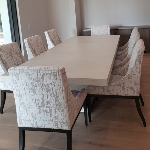 8 dining chairs around rectangular dining table