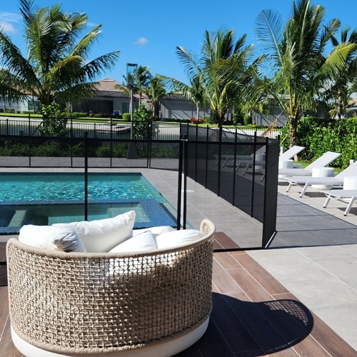 poolside with loveseat and lounge chairs