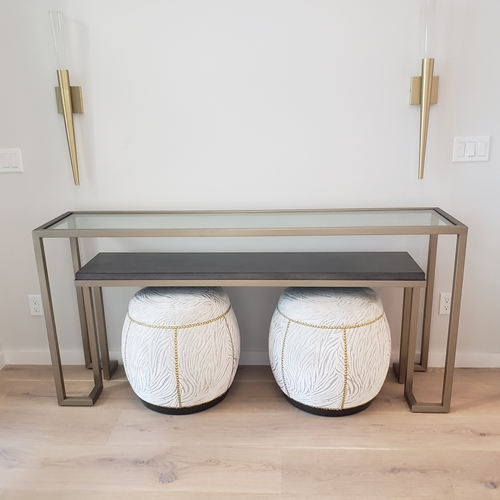 nested side tables with poufs underneath